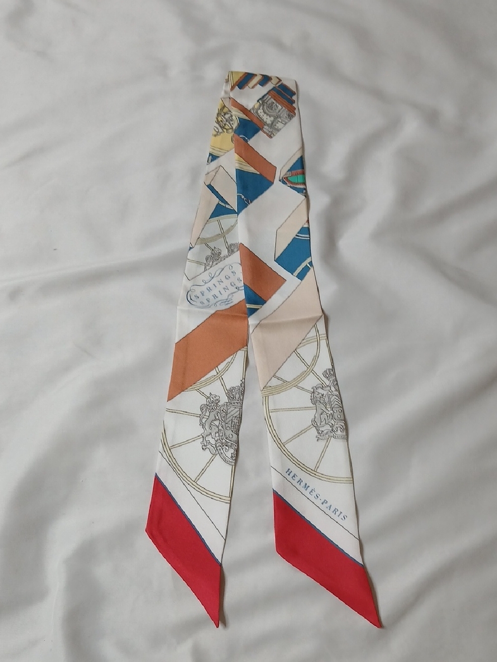 Hermes Springs Springs White Silk Twilly with Red, Blue and Tan Accents